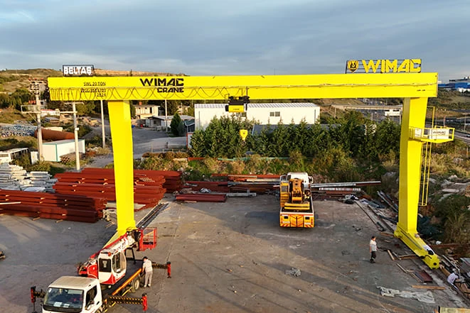 L-type gantry crane built to order, its asymmetrical leg leaving side access unobstructed