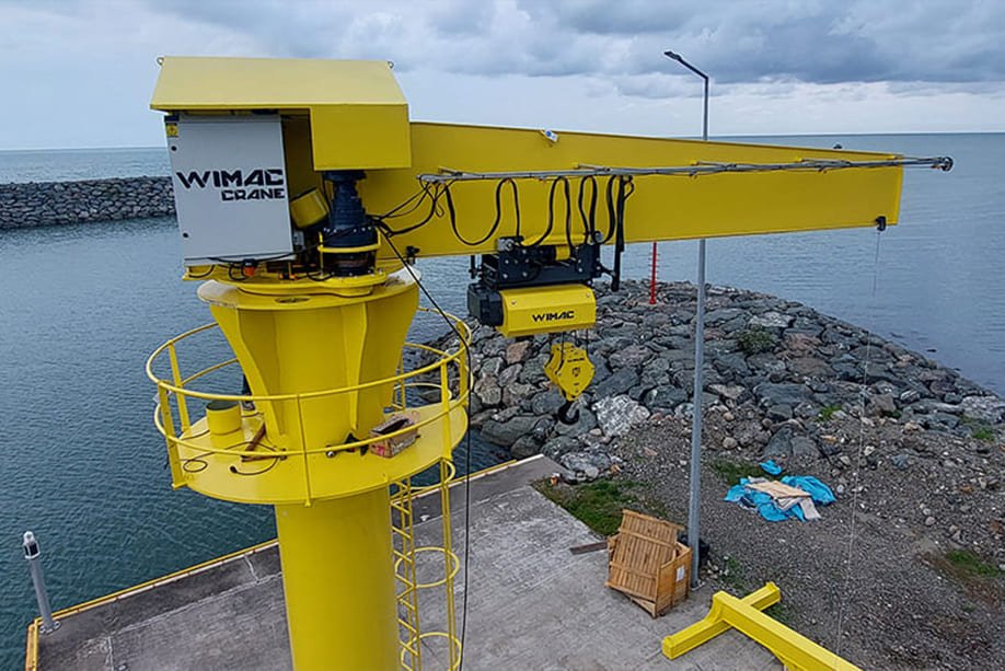 Electric hoist mounted on the boom trolley of a jib crane