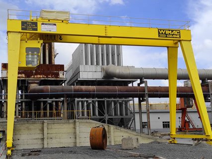 Turkish-built unledged portal crane for Egypt, running on an elevated runway beam